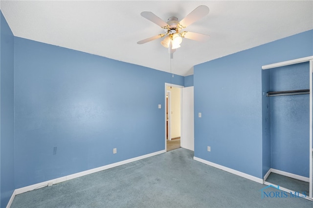 unfurnished bedroom featuring carpet flooring, ceiling fan, and a closet