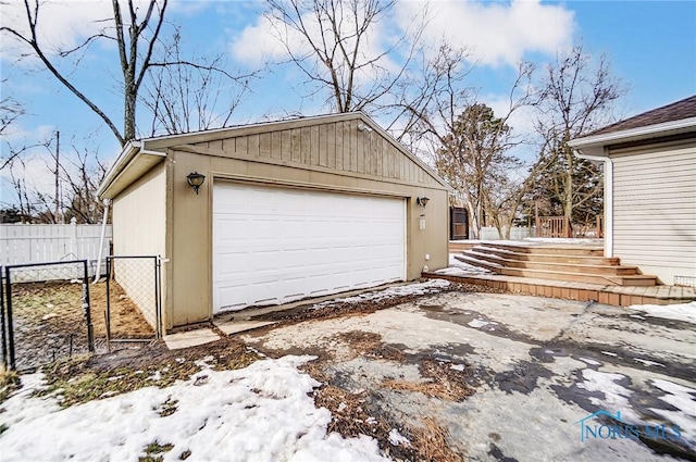 view of snow covered garage