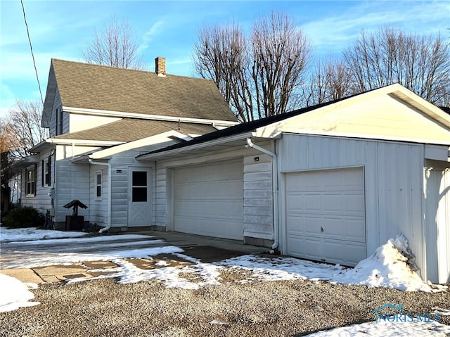 exterior space with a garage