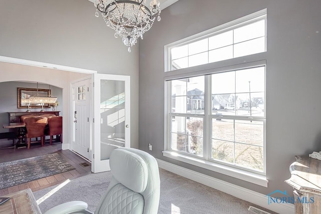 interior space with an inviting chandelier