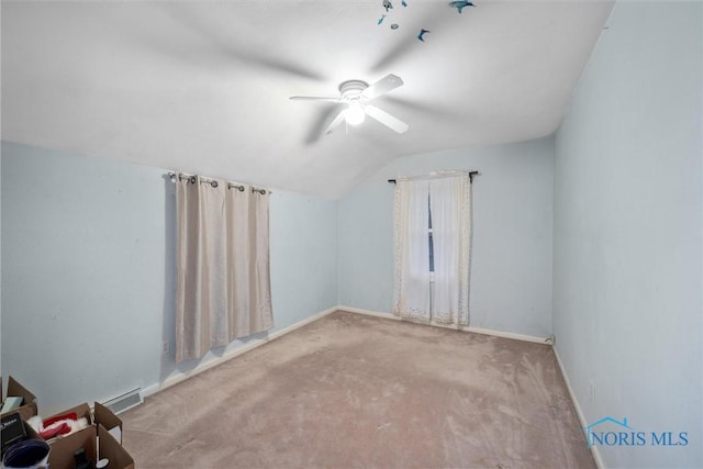 bonus room with ceiling fan, lofted ceiling, and carpet floors