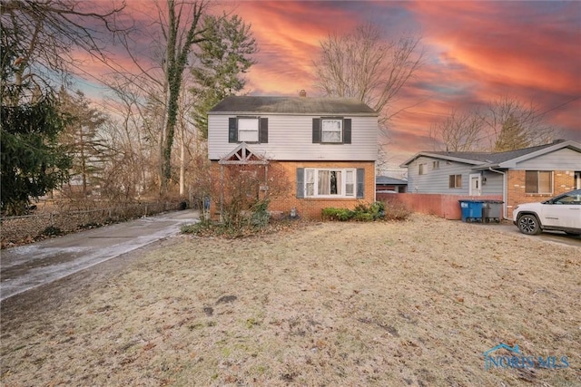 view of property with a lawn