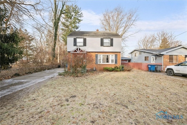 view of front property with a front lawn