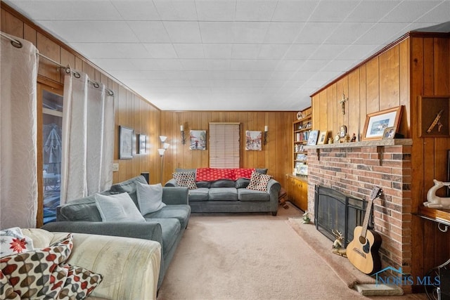 living room featuring wooden walls, light colored carpet, and a fireplace