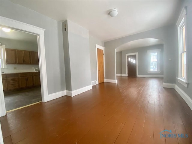 interior space featuring dark wood-type flooring