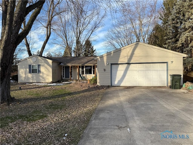 single story home featuring a garage