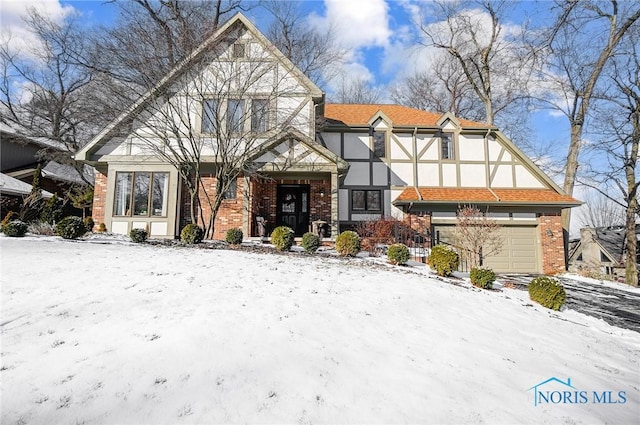 tudor house with a garage