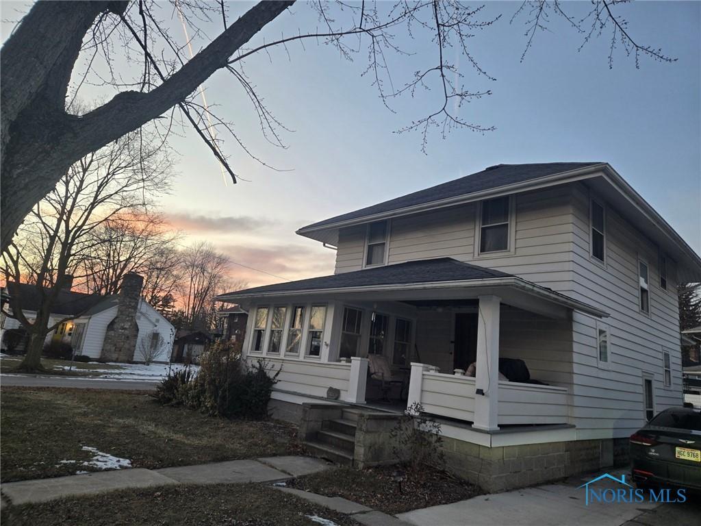 bungalow featuring covered porch