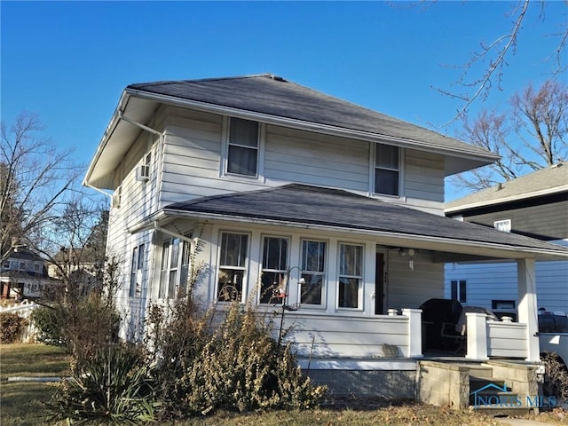 front of property featuring covered porch