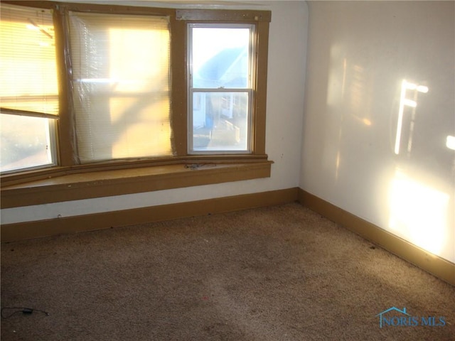 empty room with carpet floors