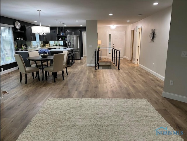 dining area featuring hardwood / wood-style flooring