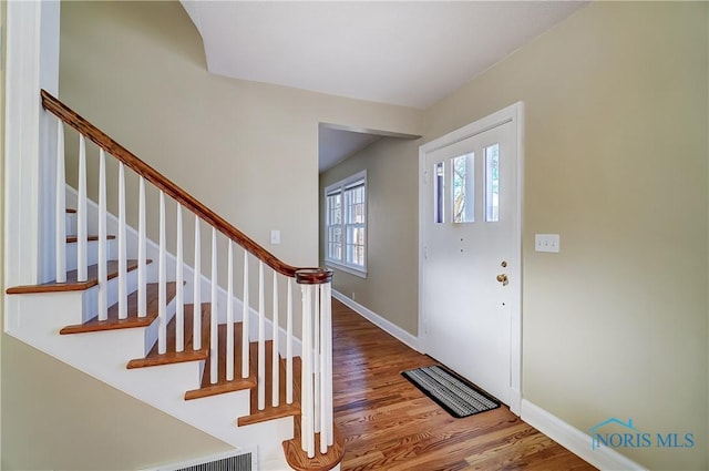 entrance foyer with hardwood / wood-style floors