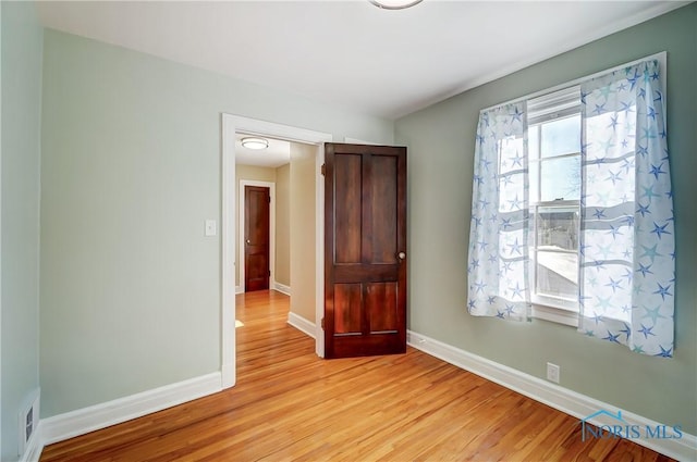 empty room featuring light hardwood / wood-style flooring