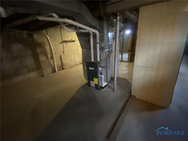 basement with heating unit