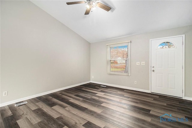 entryway featuring lofted ceiling, dark hardwood / wood-style floors, and ceiling fan