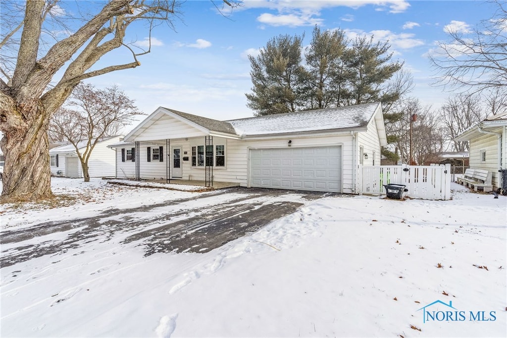 view of front of home with a garage