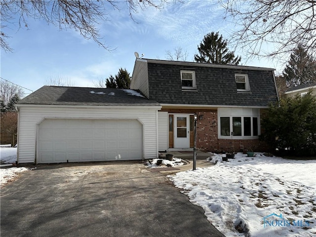 front of property featuring a garage