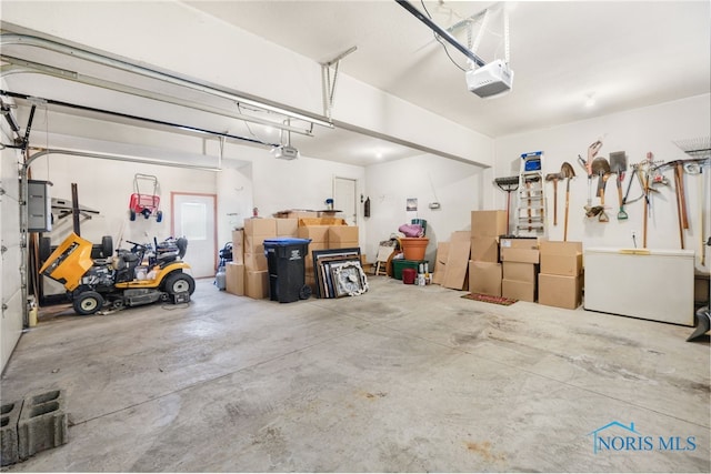 garage featuring a garage door opener