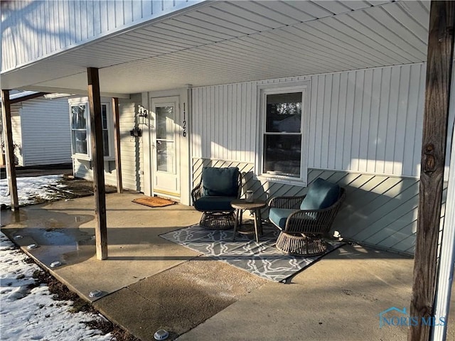 view of snow covered patio