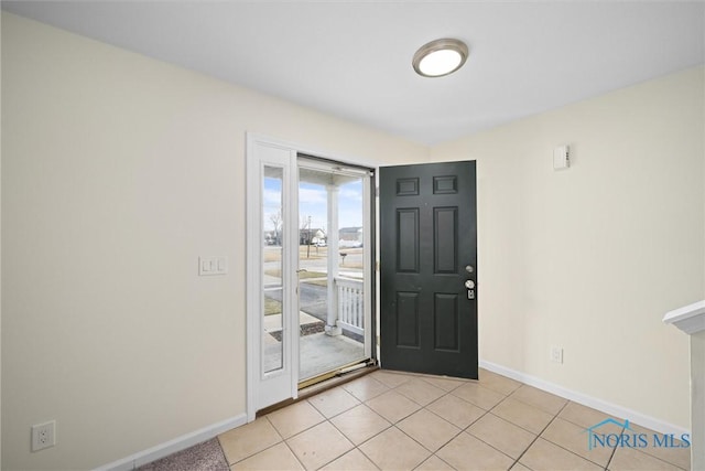 view of tiled foyer entrance