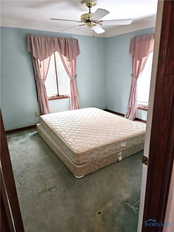 unfurnished bedroom featuring ceiling fan