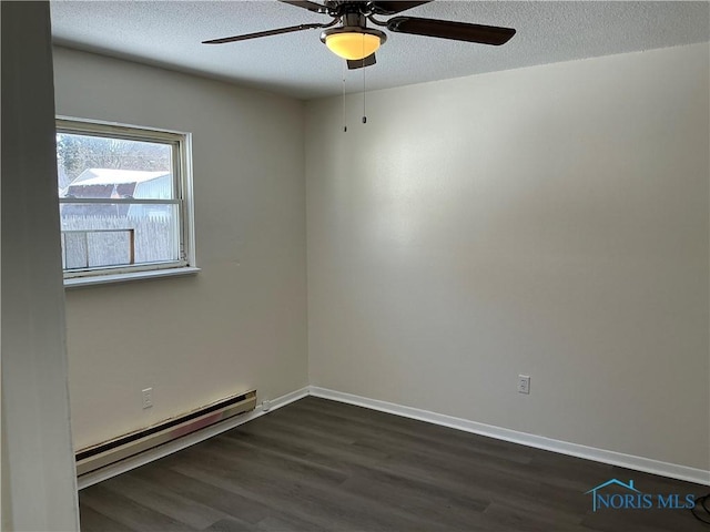 unfurnished room featuring ceiling fan, a textured ceiling, a baseboard heating unit, baseboards, and dark wood-style floors