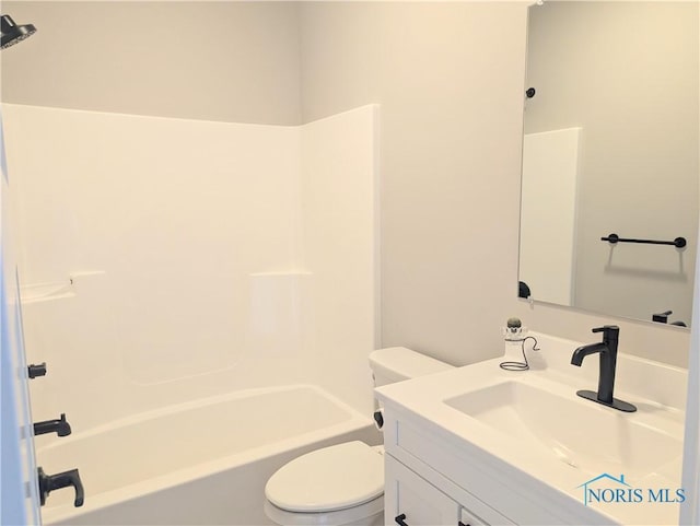 full bathroom featuring vanity, shower / bathtub combination, and toilet