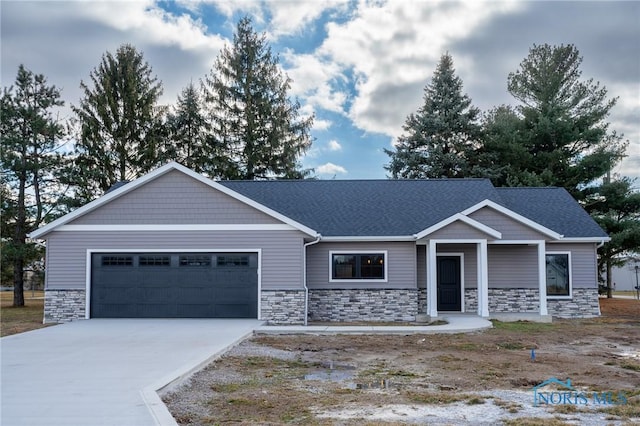 craftsman house with a garage