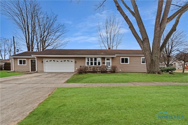 ranch-style house with a garage and a front lawn