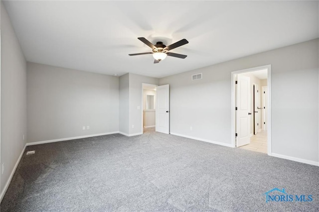 unfurnished bedroom featuring ceiling fan and light carpet