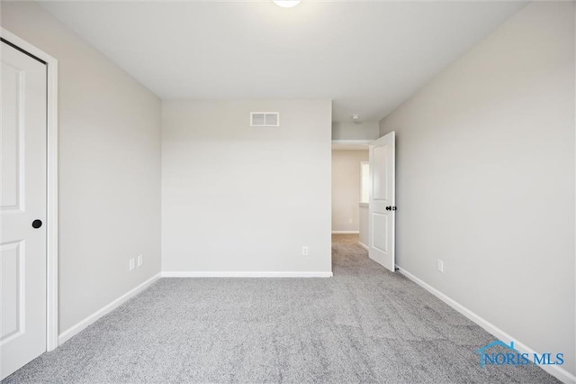 unfurnished bedroom featuring carpet