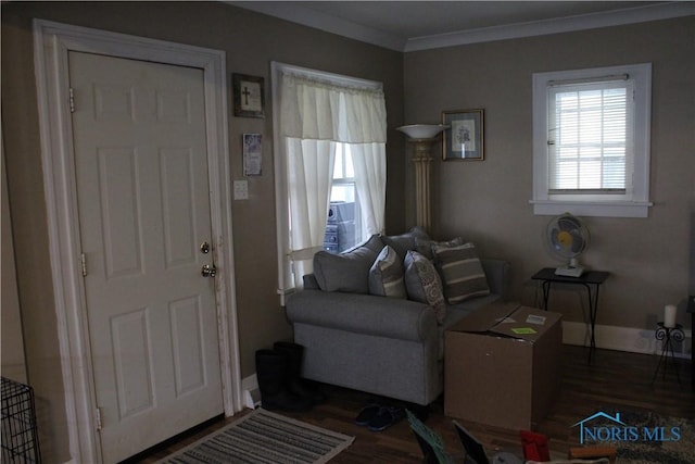 living room with dark wood-type flooring and crown molding