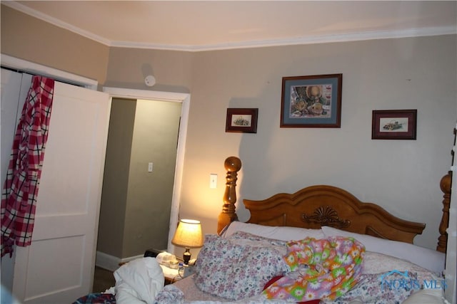 bedroom featuring ornamental molding