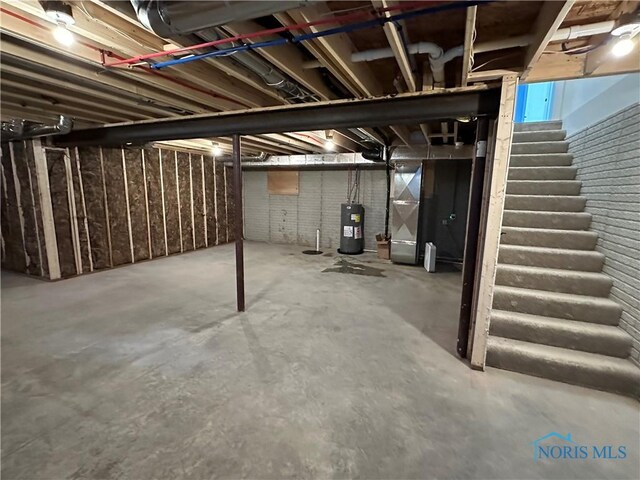 2016 Oakside, Toledo, OH 43615 - unfinished basement with electric water heater and stairs