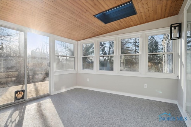 unfurnished sunroom with wood ceiling and lofted ceiling