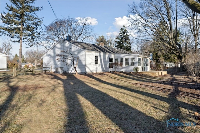 view of property exterior featuring a yard