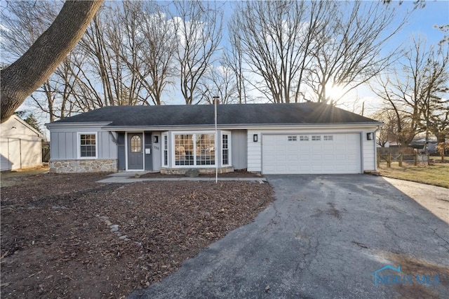 ranch-style house with a garage