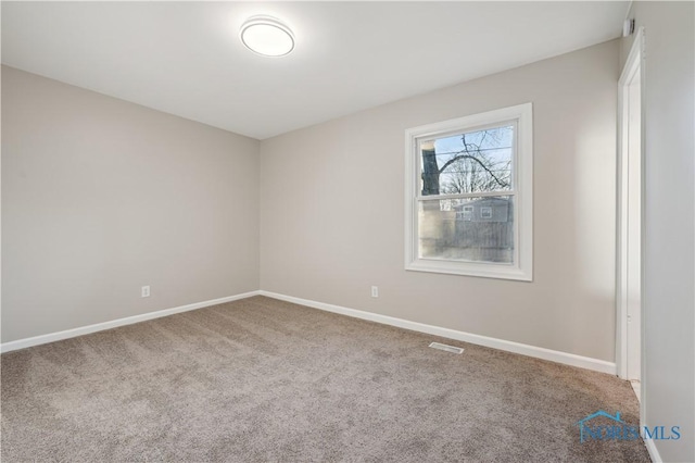 view of carpeted spare room