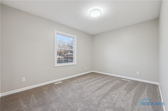 view of carpeted spare room