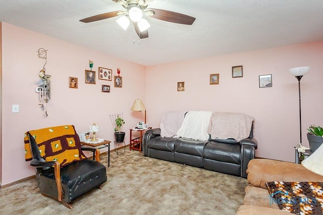 living room with carpet flooring and ceiling fan