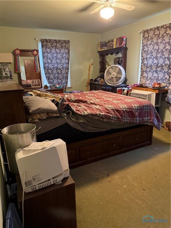 bedroom with carpet and ceiling fan