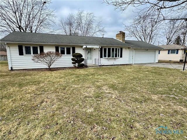 single story home with a garage and a front yard