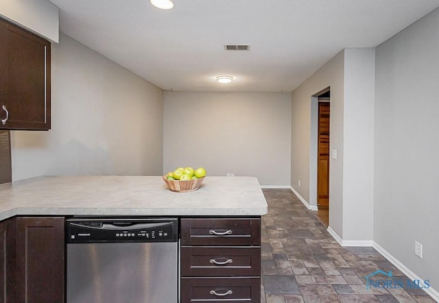 kitchen featuring stainless steel dishwasher, dark brown cabinetry, and kitchen peninsula