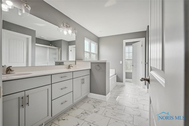 bathroom with vanity and plus walk in shower