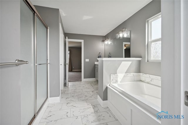 bathroom featuring vanity and plus walk in shower