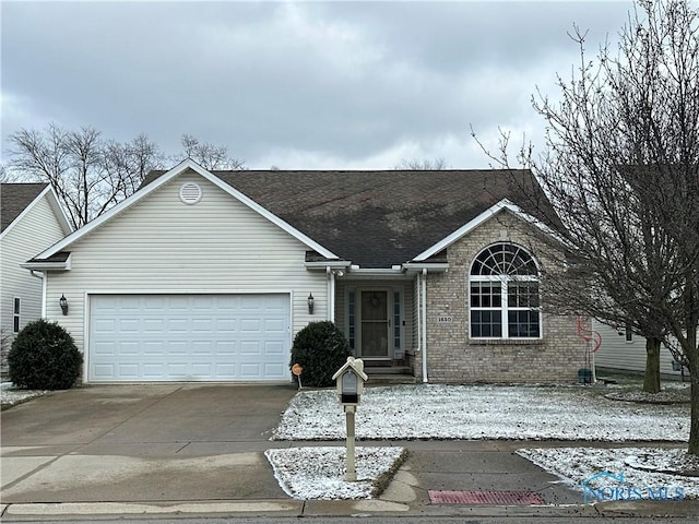 single story home featuring a garage