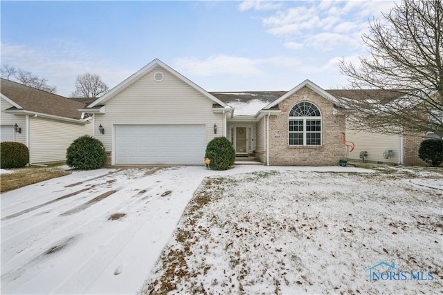 single story home with a garage