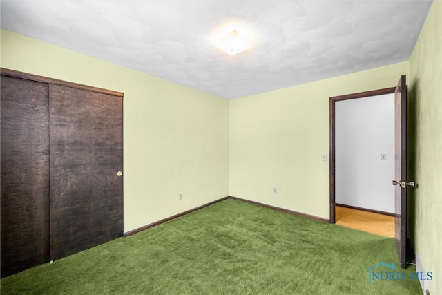 unfurnished bedroom with carpet flooring