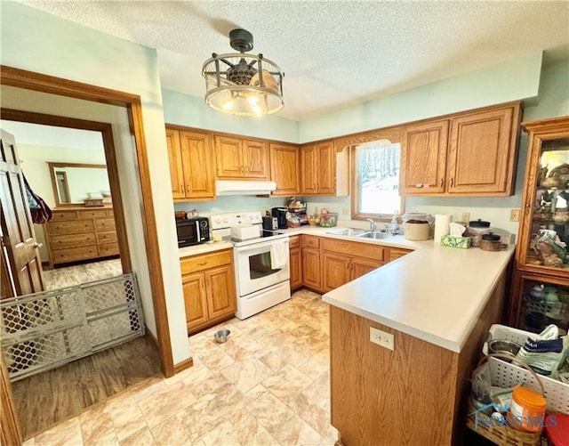 kitchen featuring kitchen peninsula, white range with electric cooktop, sink, a textured ceiling, and pendant lighting