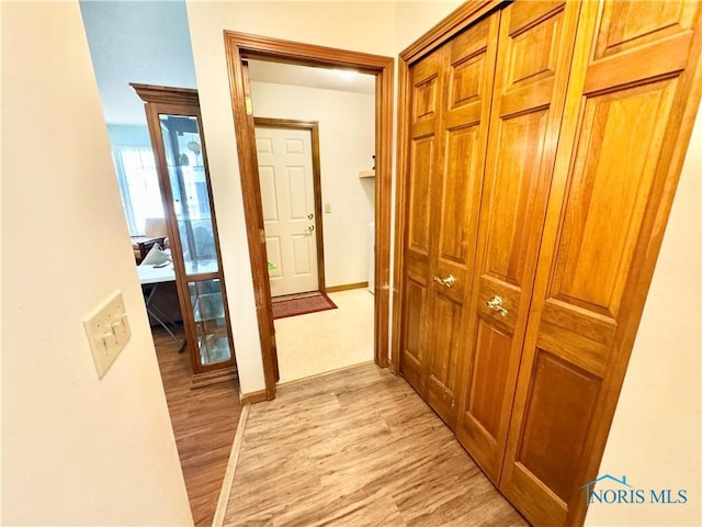 hall featuring light hardwood / wood-style flooring